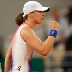 Swiatek sets up Osaka blockbuster with opening win at French Open