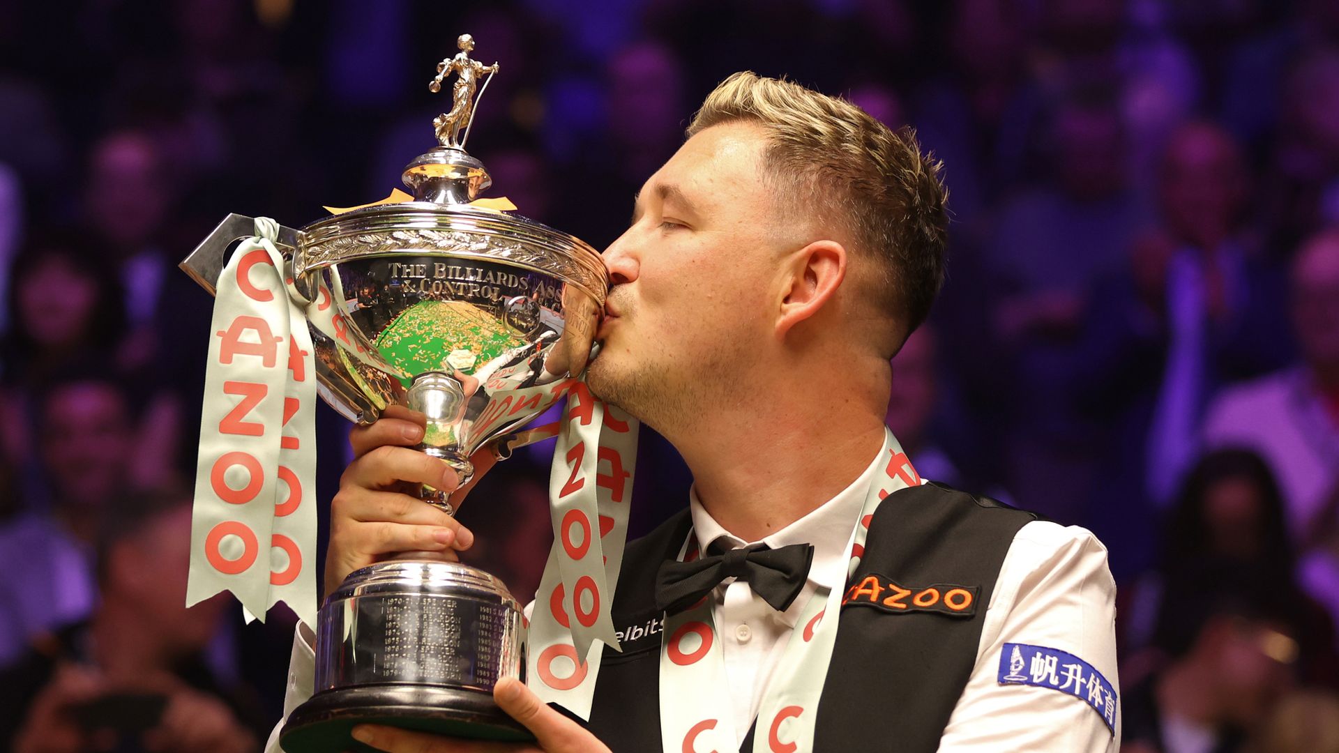 Nervy Wilson holds off Jones rally to win World Snooker final