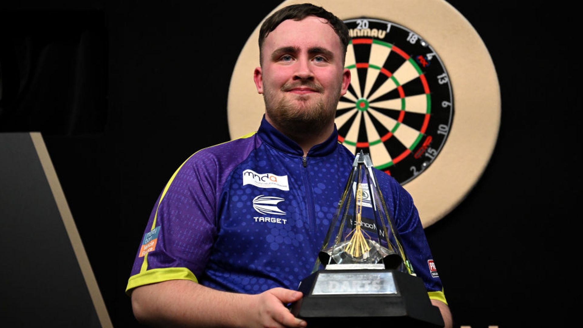 Nine-dart Littler beats Humphries to win Premier League