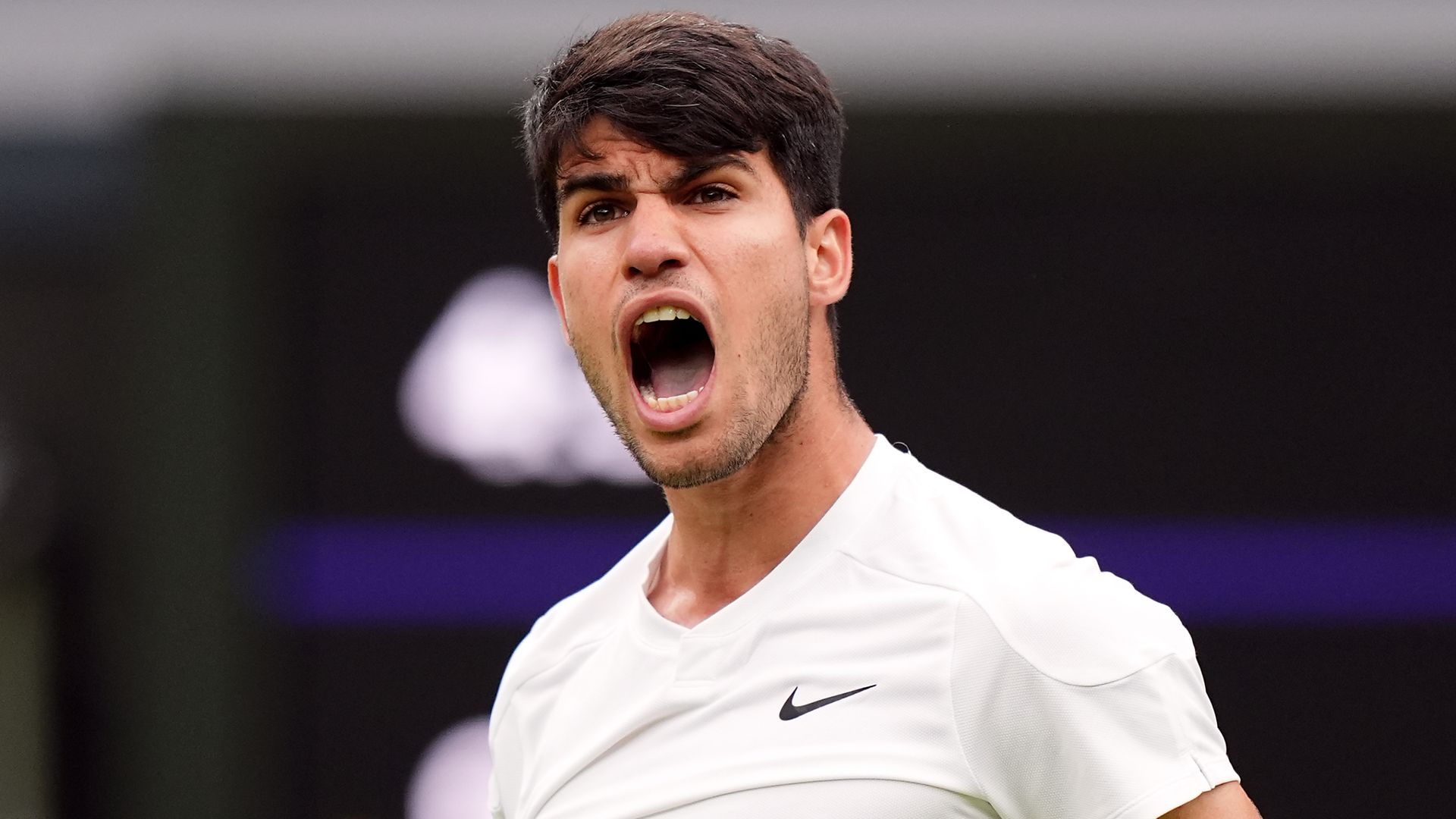 Alcaraz survives Humbert scare to reach Wimbledon quarter-finals