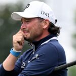 Emotional Ferguson clinches Open spot with win in Germany