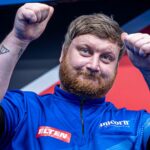 Menzies beats Bunting to claim maiden title as three throw nine-darters