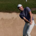 Bunker nightmare for McIlroy as Waring breaks course record