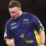 Littler sets up World Championship final showdown with MVG