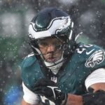 Barkley leads Eagles past Rams in the snow to reach NFC title game