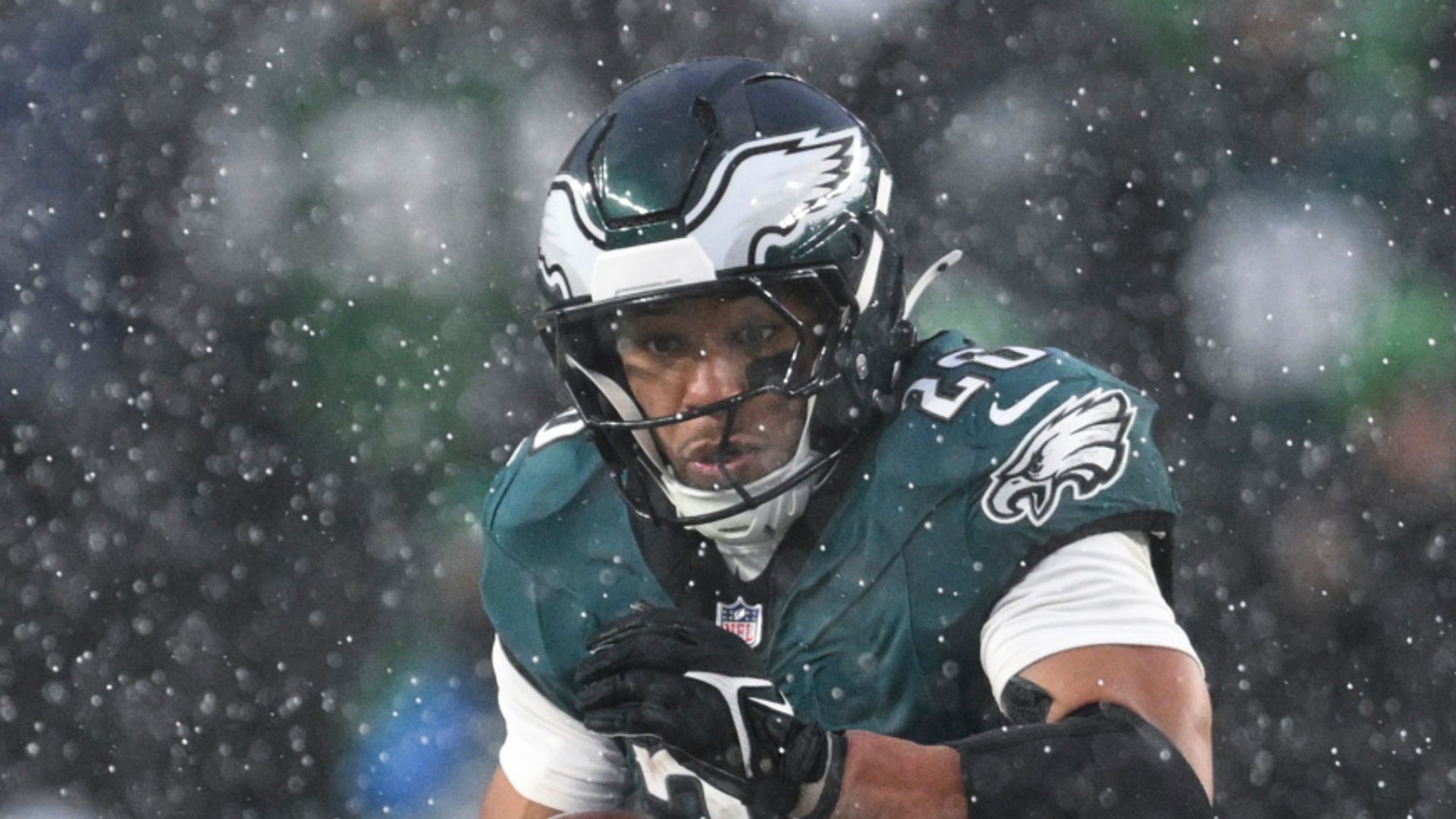 Barkley leads Eagles past Rams in the snow to reach NFC title game