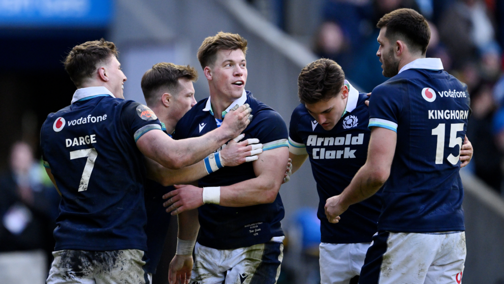 Jones hat-trick sees Scotland survive Italy scare