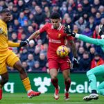 Liverpool go seven clear with nervy win over Wolves