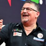 Three nine-darters and MVG out early as Anderson wins milestone title