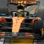 Norris just holds off Verstappen to win chaotic rain-hit Australian GP