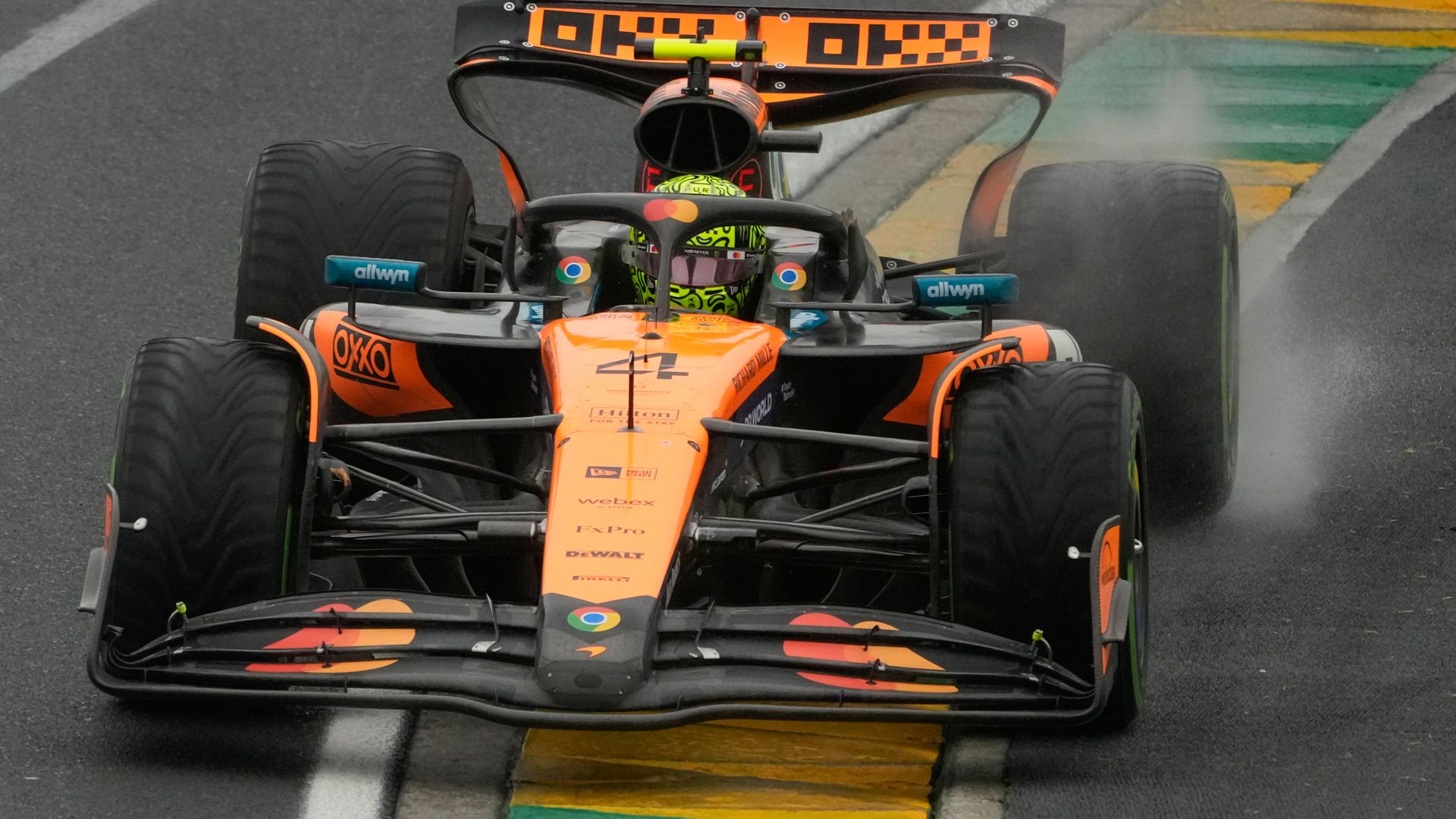 Norris just holds off Verstappen to win chaotic rain-hit Australian GP