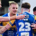 Leeds show nerves of steel to beat Wigan after Hall’s bizarre assist